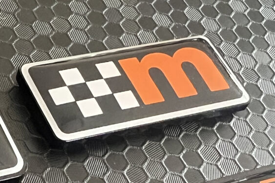 M Logo Gel badge - Perspex Mounted - Orange